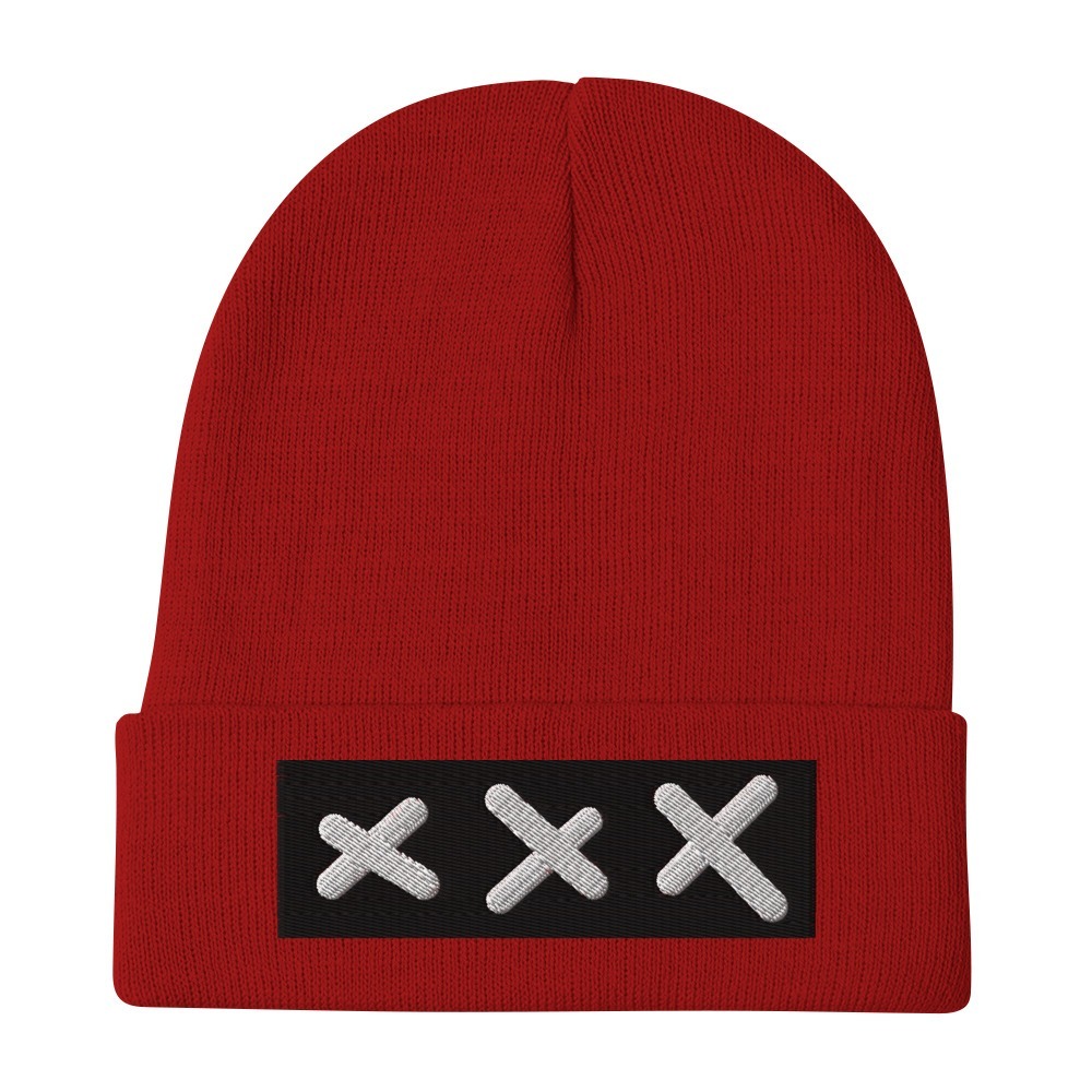 Introducing the Bold & brave XXX (3 Amsterdam Crosses) embroidered Beanie, a striking red knit beanie featuring a black front patch adorned with three white Amsterdam Crosses embroidered in a row. Introducing the Bold & brave XXX (3 Amsterdam Crosses) embroidered Beanie, a striking red knit beanie featuring a black front patch adorned with three white Amsterdam Crosses embroidered in a row.