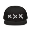 A black XXX Snapback Cap with a grey under visor, featuring three embroidered white Amsterdam Crosses on the front. A black XXX Snapback Cap with a grey under visor, featuring three embroidered white Amsterdam Crosses on the front.