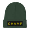 The Bold & brave CHAMP Embroidered Beanie is a green knit accessory featuring a folded brim and a black patch with CHAMP embroidered in bold yellow letters. The Bold & brave CHAMP Embroidered Beanie is a green knit accessory featuring a folded brim and a black patch with CHAMP embroidered in bold yellow letters.