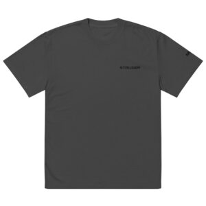 The STRIJDER Oversized faded shirt is a plain dark gray t-shirt with minimalistic text STRIJDER in black on the front, and a small black logo on the left sleeve, offering subtle detail to this classic crew neck design.