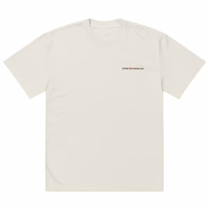 The Oversized faded t-shirt is a plain, light beige top with subtle fading and small black ADAM XXX tastes oud text on the left chest. It features an oversized fit and a minimalistic design with no extra graphics or patterns.
